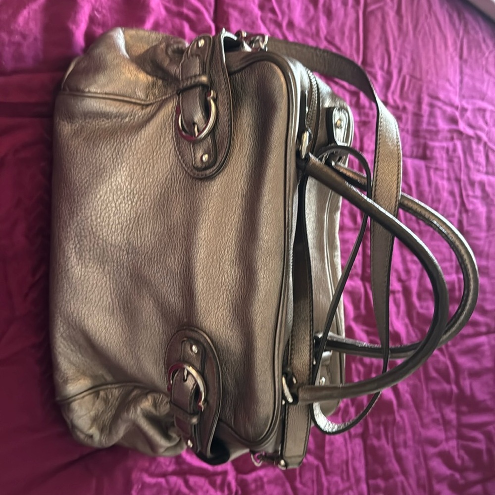 Gold Ferragamo purse excellent condition